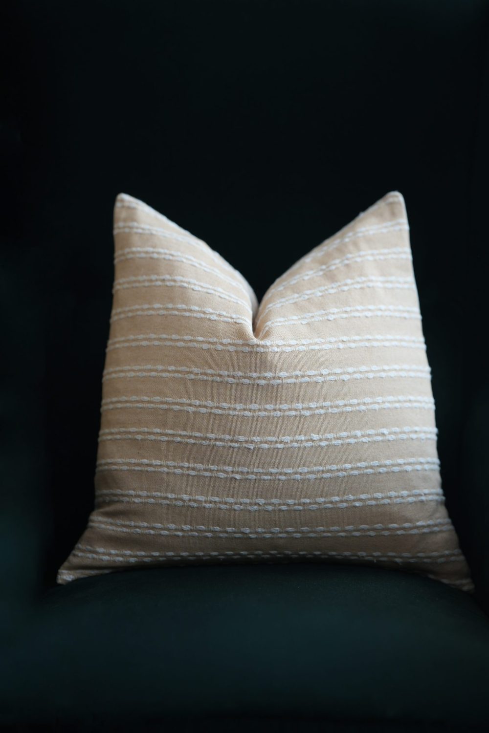 Woven cotton cushion cover in beige with white stripes pattern