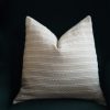 Woven cotton cushion cover in beige with white stripes pattern